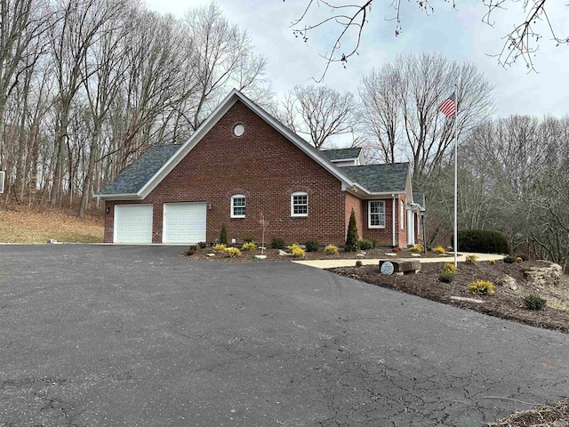 view of home's exterior with a garage