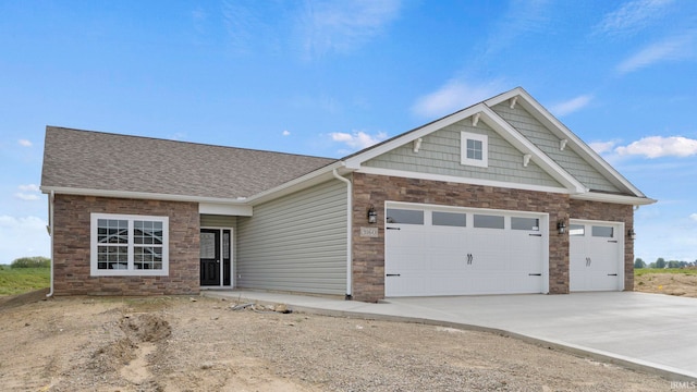 craftsman inspired home featuring a garage