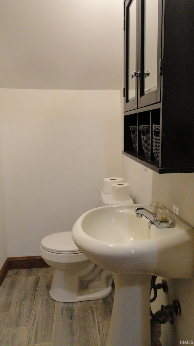 bathroom featuring toilet