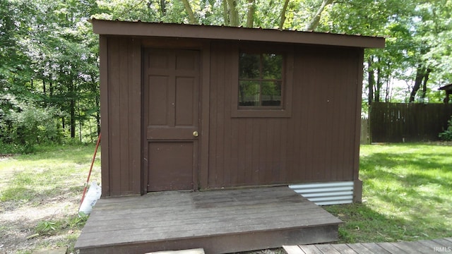 view of outdoor structure with a lawn