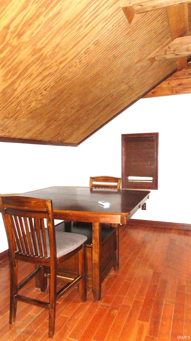 additional living space featuring lofted ceiling, wood-type flooring, and wood ceiling