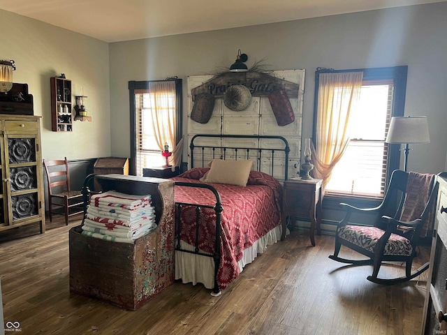 bedroom with hardwood / wood-style floors