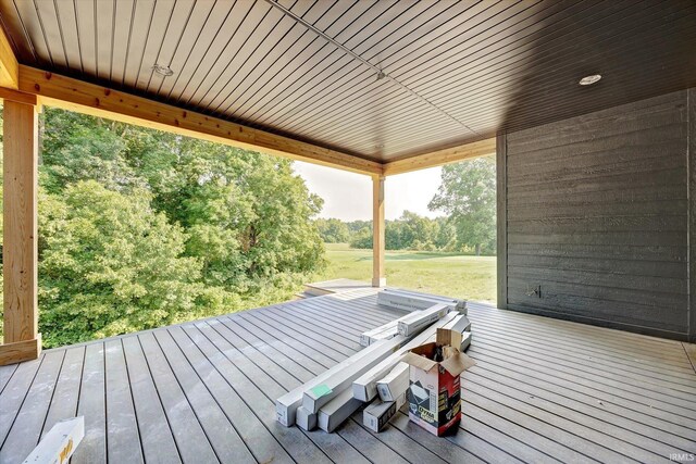 unfurnished living room featuring wood-type flooring