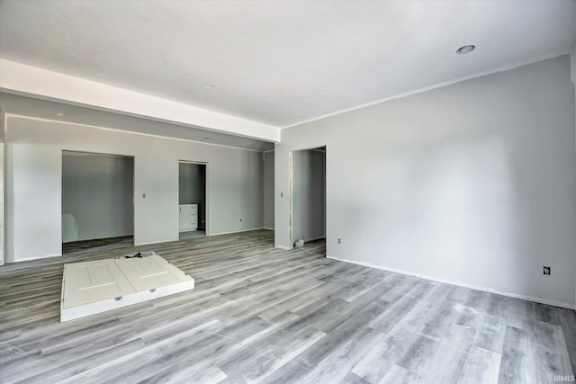 unfurnished room with hardwood / wood-style floors