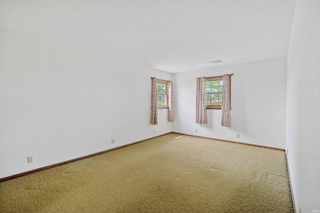 empty room featuring carpet