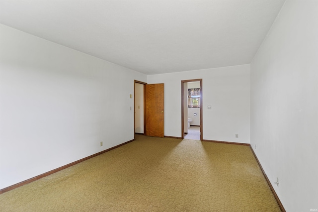 empty room featuring carpet flooring