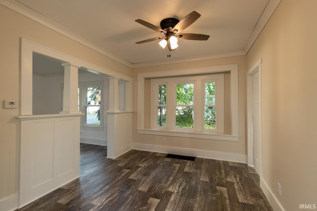 unfurnished room with dark wood-type flooring, plenty of natural light, and ceiling fan