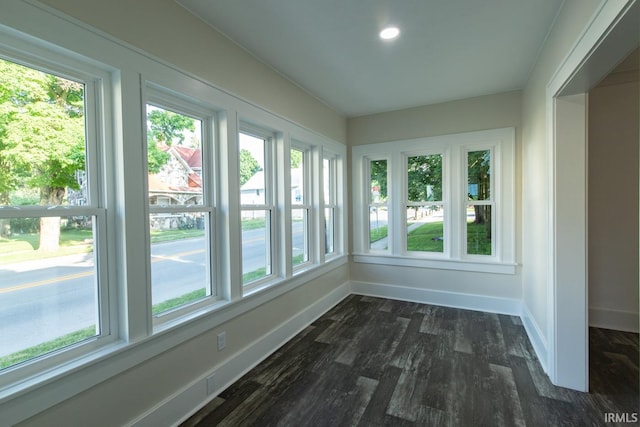 unfurnished sunroom with plenty of natural light