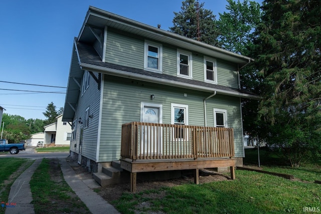 rear view of property with a deck