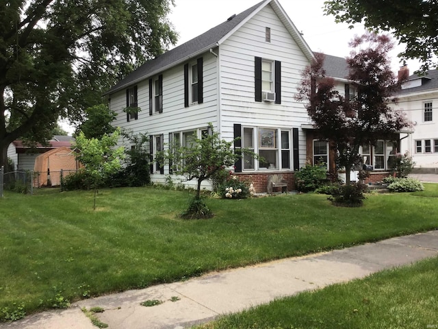 view of front of home with a front yard