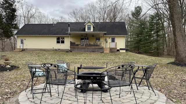 0 N State Road 450, Shoals, IN 47581 - back of property with a deck, a lawn, a patio, and an outdoor fire pit