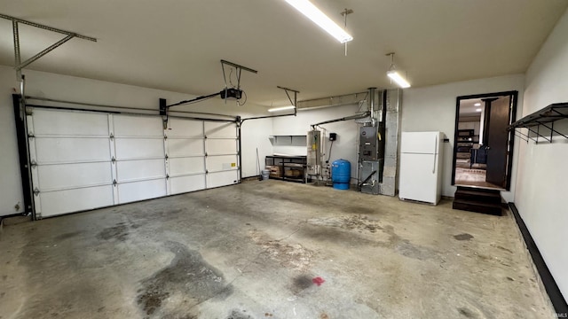0 N State Road 450, Shoals, IN 47581 - garage with freestanding refrigerator and a garage door opener