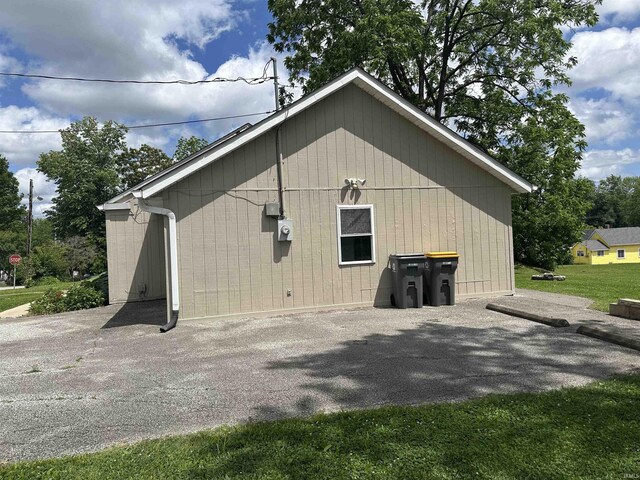 garage with a yard