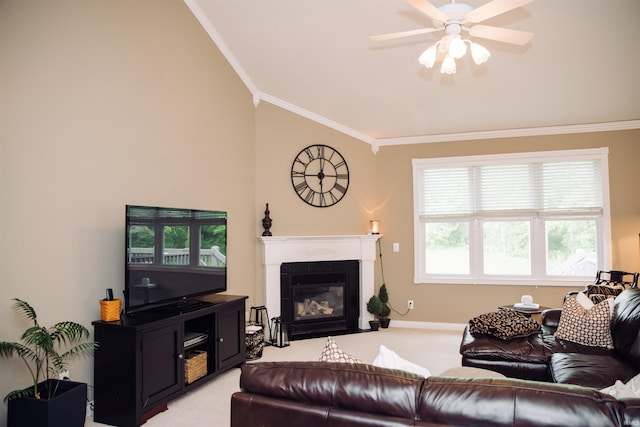 living room with crown molding, ceiling fan, a fireplace, and light colored carpet