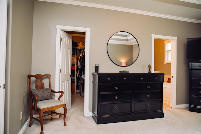 living area with light carpet, baseboards, and ornamental molding