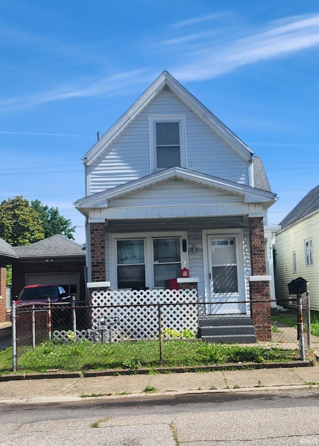 view of front of property featuring covered porch