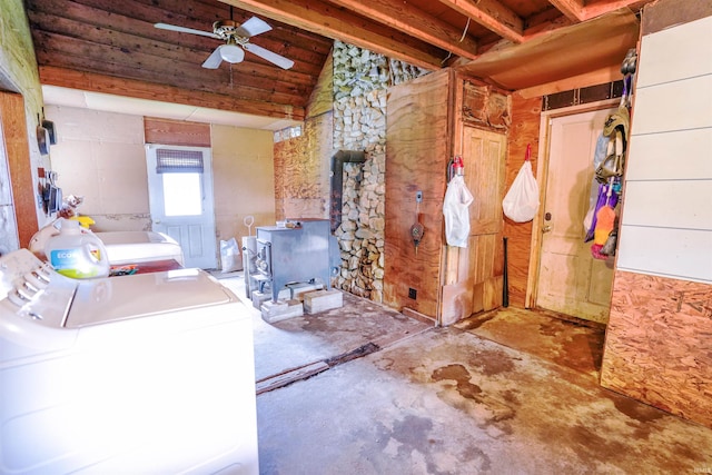 washroom with ceiling fan and washer / dryer