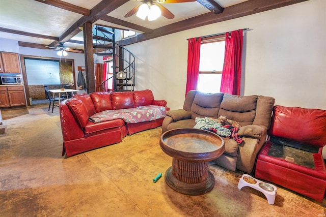 living room with beam ceiling and ceiling fan