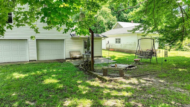 view of yard featuring a garage