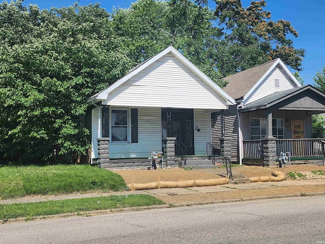 bungalow-style home with a porch