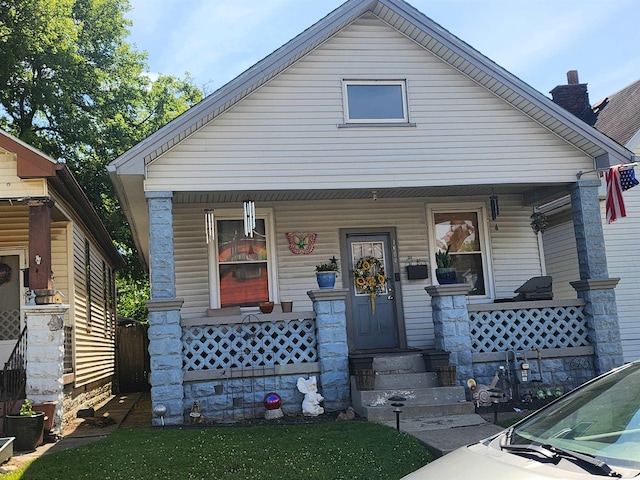 bungalow featuring covered porch