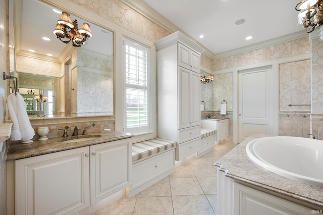 bathroom with a bathtub, tile patterned flooring, and ornamental molding