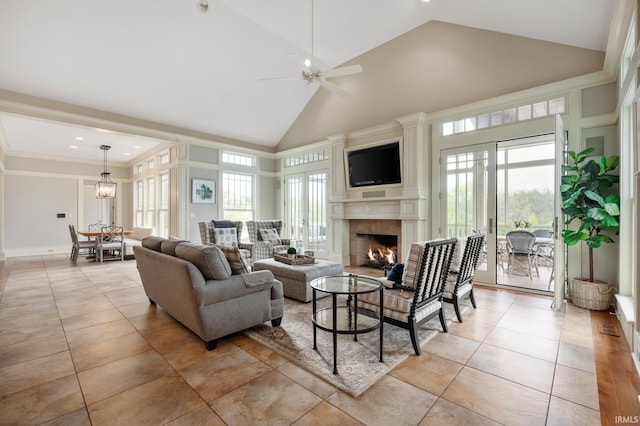 living room with high vaulted ceiling, ceiling fan, and light tile patterned flooring