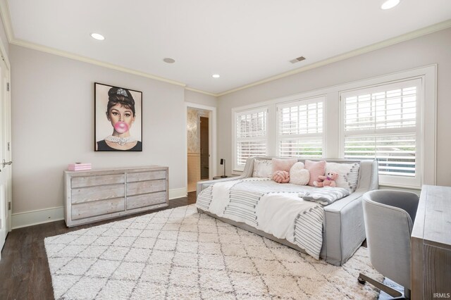 bedroom featuring ornamental molding and hardwood / wood-style flooring