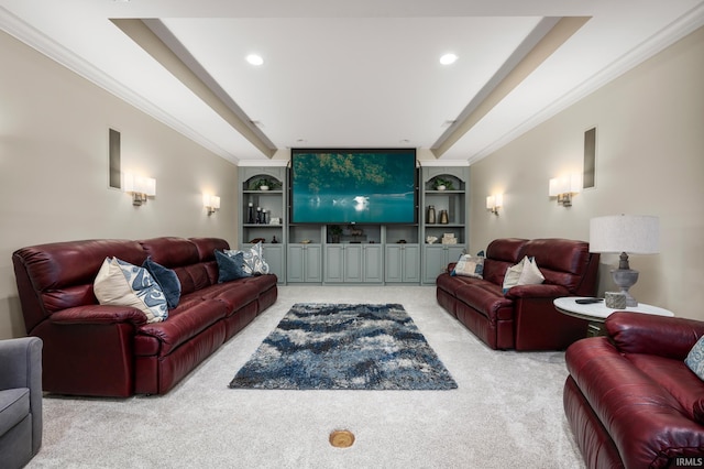 carpeted living room featuring built in features and crown molding