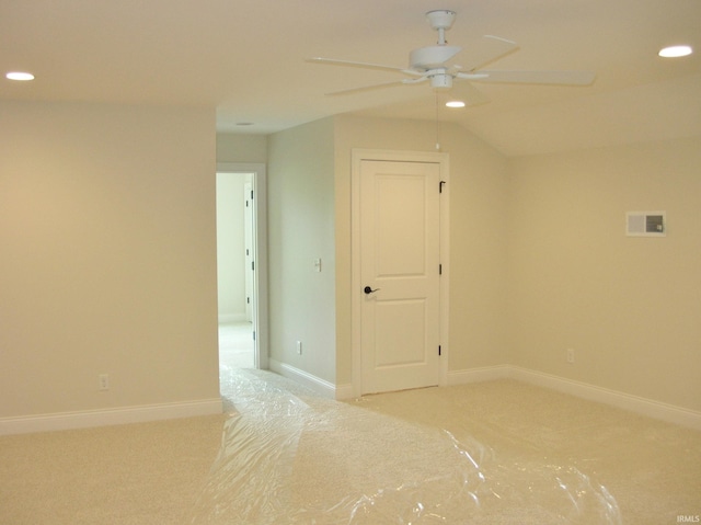 bonus room featuring light carpet, vaulted ceiling, and ceiling fan