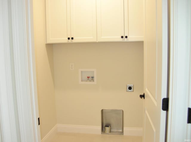 laundry area featuring cabinets, washer hookup, and hookup for an electric dryer