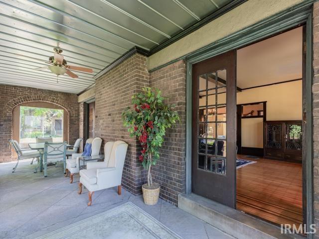 view of patio / terrace featuring ceiling fan