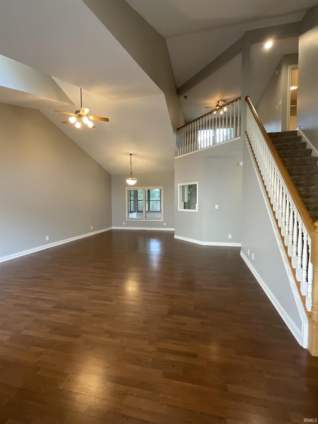 unfurnished living room featuring ceiling fan, dark hardwood / wood-style flooring, and high vaulted ceiling