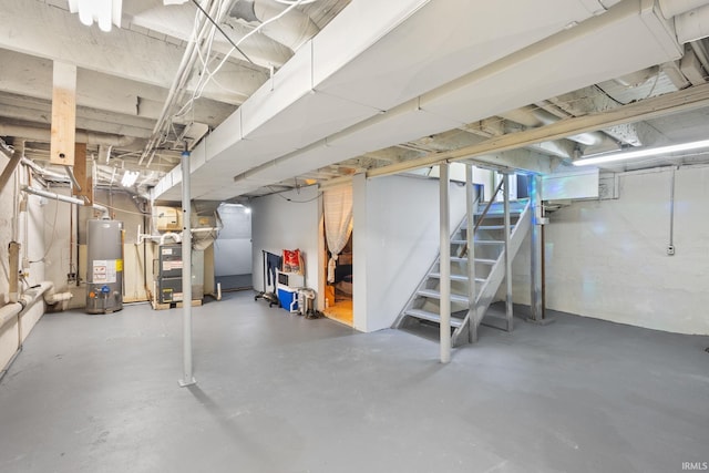 basement with heating unit and water heater