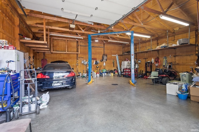 garage featuring a garage door opener