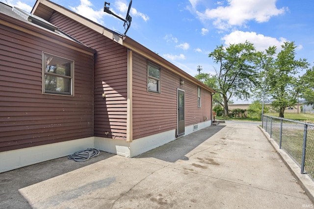 view of home's exterior featuring a patio