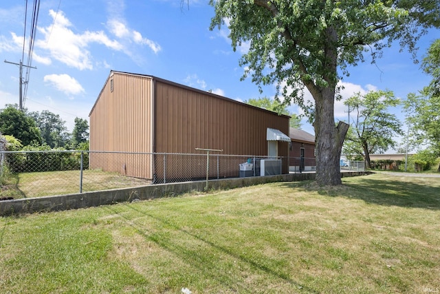 view of property exterior with a lawn