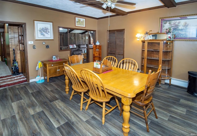 dining space with dark hardwood / wood-style floors, ceiling fan, ornamental molding, and a textured ceiling