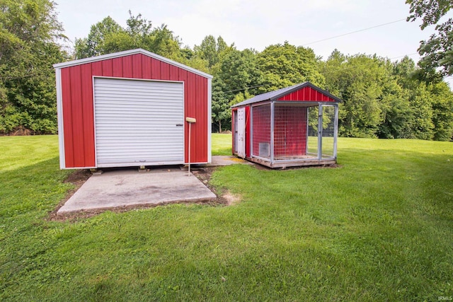 view of outdoor structure with a lawn