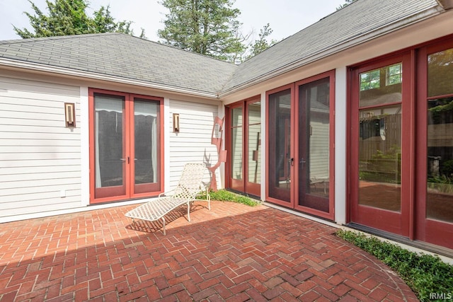 doorway to property featuring french doors