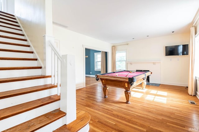 game room featuring light hardwood / wood-style floors and pool table