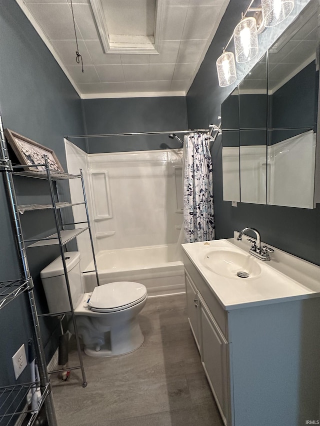 full bathroom featuring shower / bath combo, toilet, crown molding, and vanity