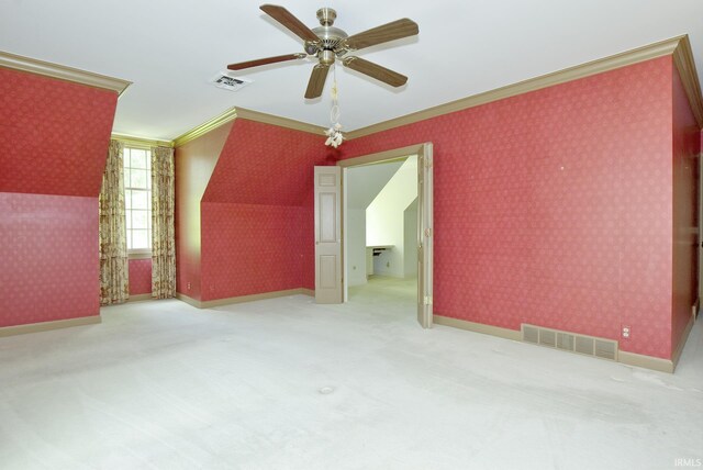 bonus room with carpet floors and ceiling fan