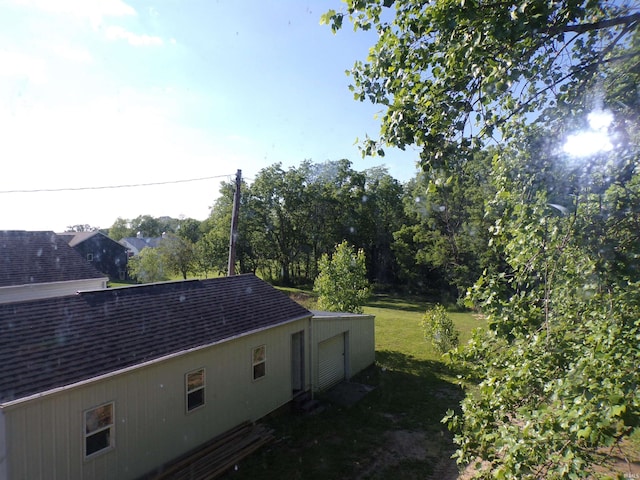 view of home's exterior featuring a yard