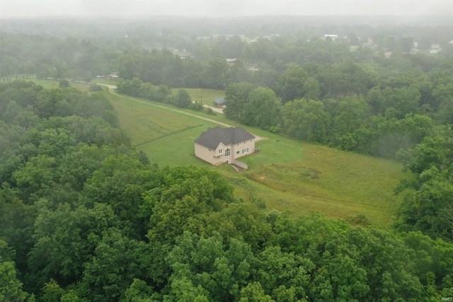 birds eye view of property featuring a rural view