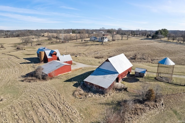 birds eye view of property featuring a rural view