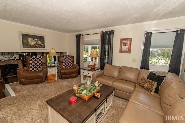 living room featuring a fireplace, light carpet, a textured ceiling, and crown molding