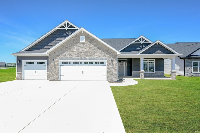 craftsman-style house with a front lawn and a garage