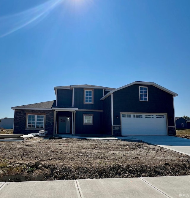 view of front of property with a garage