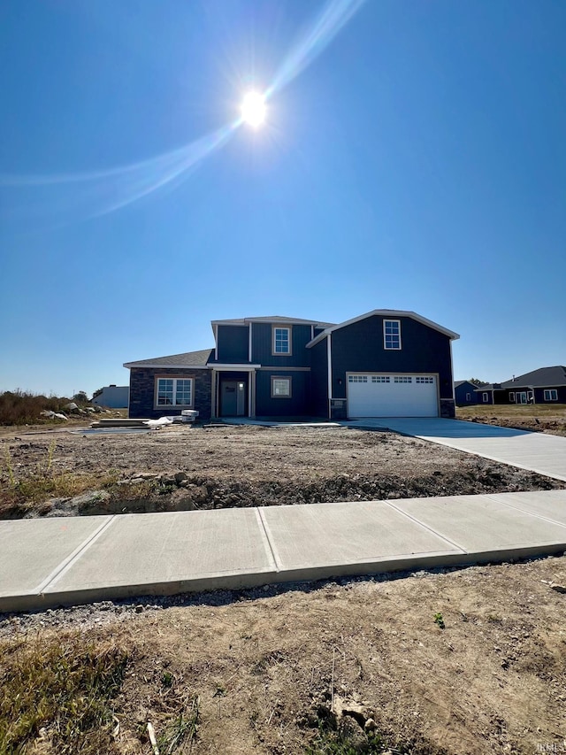 view of front of home with a garage